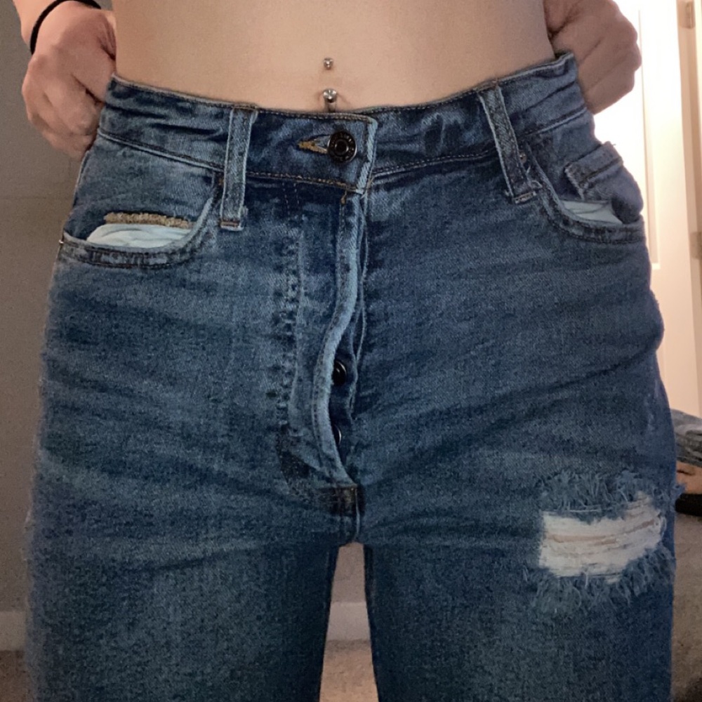 distressed blue jeans